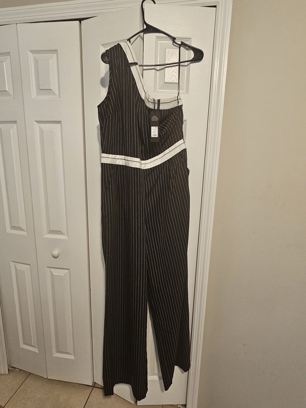 Fashion Nova Black Pinstripe One-Shoulder Jumpsuit with White Trim
